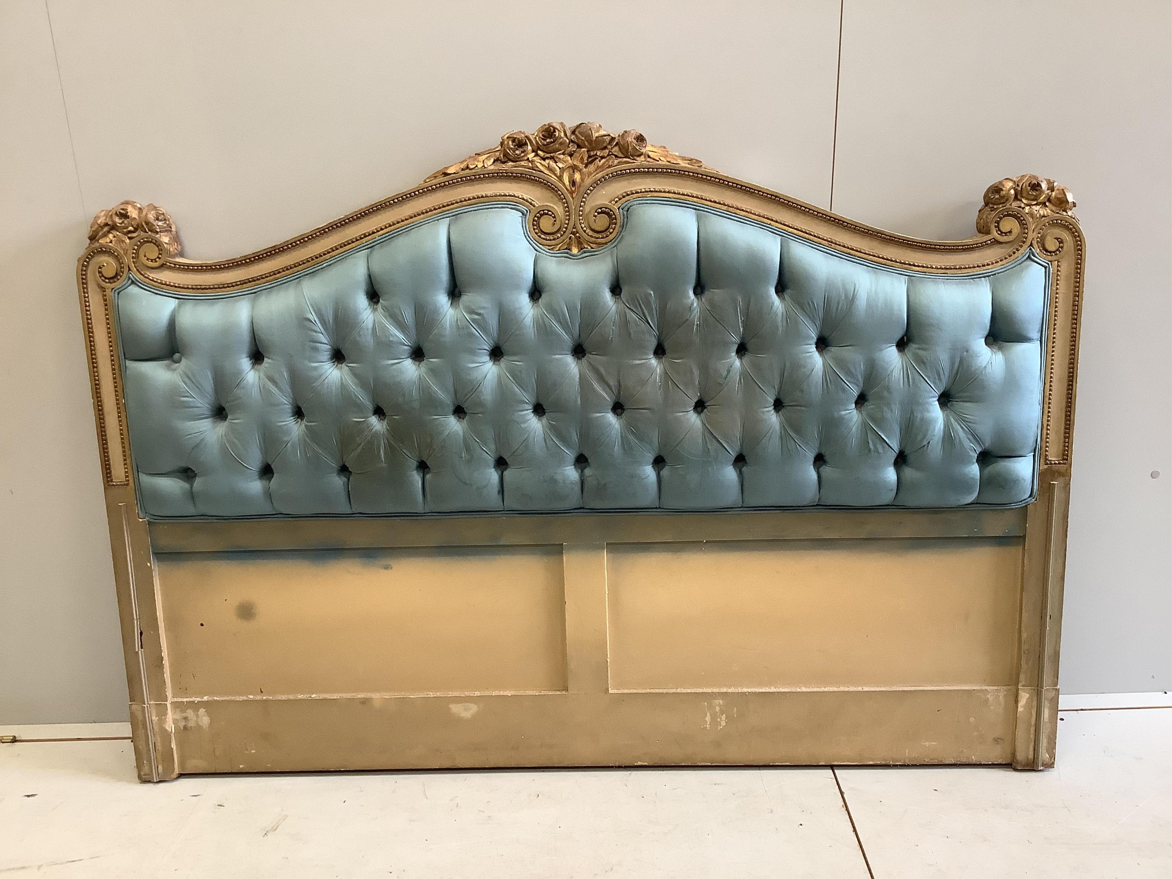 A Louis XV style carved cream and gilt carved wood head and foot bedstead, width 160cm, height 112cm. Condition - good but no side rails